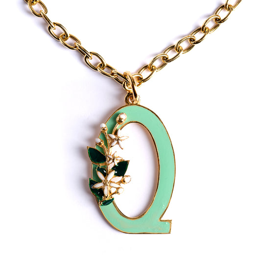 Letter Q pendant with Orange Blossom Bloom